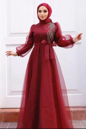 Burgundy Princess Hijab Dress worn by a model, showcasing a sophisticated and modest design, available at Noor Boutique in the GTA.