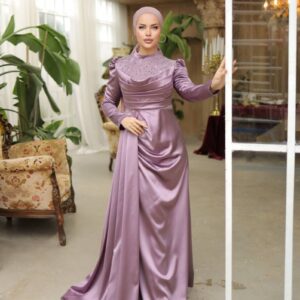 Pink Satin Evening Hijab Dress worn by a model, showcasing a luxurious and modest design, available at Noor Boutique in the GTA.