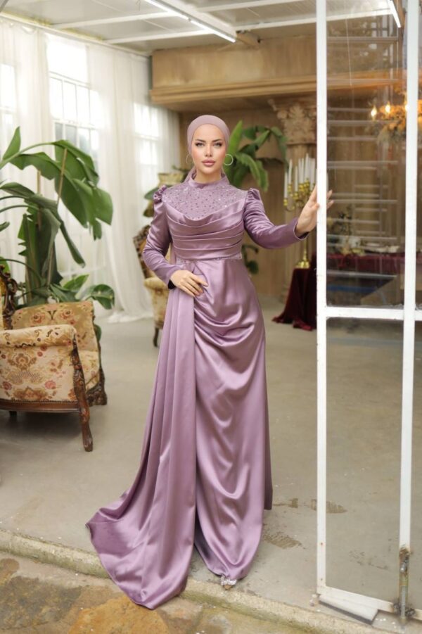 Pink Satin Evening Hijab Dress worn by a model, showcasing a luxurious and modest design, available at Noor Boutique in the GTA.