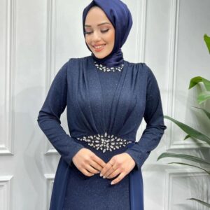 Navy Blue Evening Hijab Dress with Stones worn by a model, showcasing elegant embellishments and a modest design, available at Noor Boutique in the GTA.