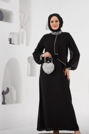 Black Crepe Evening Hijab Dress displayed on a mannequin, featuring a sophisticated and modest design, available at Noor Boutique in the GTA.