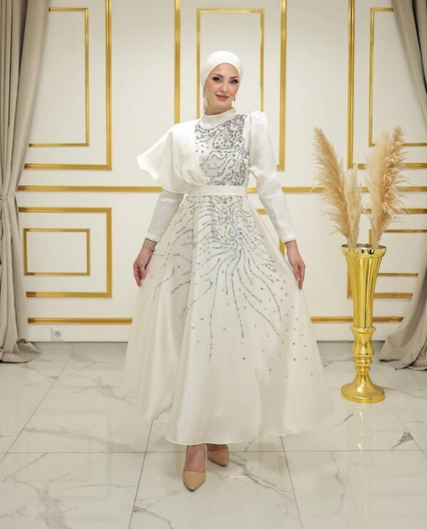 Off-White Hijab Dress displayed on a mannequin, showcasing an elegant and modest design, available at Noor Boutique in the GTA.