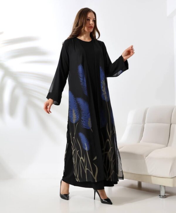 Royal Blue Two-Piece Abaya worn by a model, featuring a stylish layered design with a matching inner dress, available at Noor Boutique in the GTA.