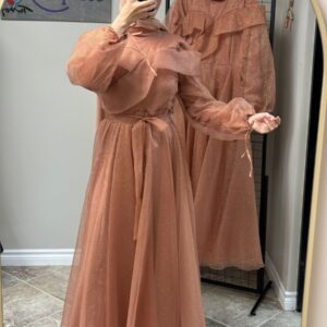 Peach Princess Hijab Dress worn by a model, showcasing a graceful and modest design, available at Noor Boutique in the GTA.