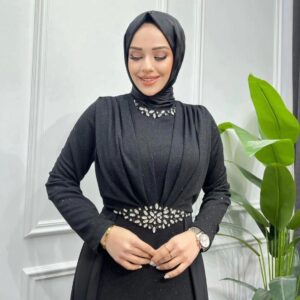 Black Evening Hijab Dress with Shiny Stones worn by a model, showcasing elegant embellishments and a modest design, available at Noor Boutique in the GTA.