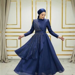 Navy Blue Evening Dress with Stones worn by a model, showcasing elegant embellishments and a modest design, available at Noor Boutique in the GTA.