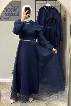 Royal Blue Evening Hijab Dress worn by a model, showcasing a graceful and modest design, available at Noor Boutique in the GTA.