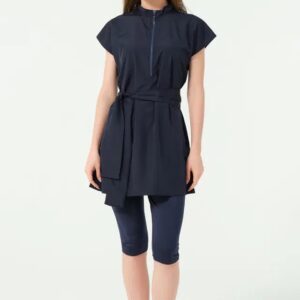 Navy blue modest swimsuit with short sleeves for youth and adults, featuring a long top and full-length leggings.
